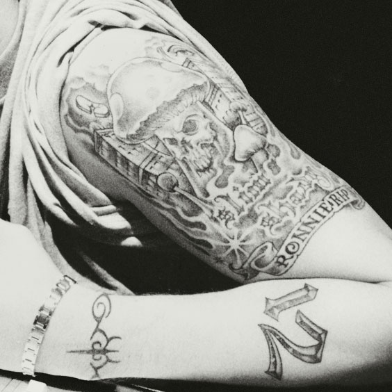 Eminem Upper Left Arm Uncle Ronnie Tattoo